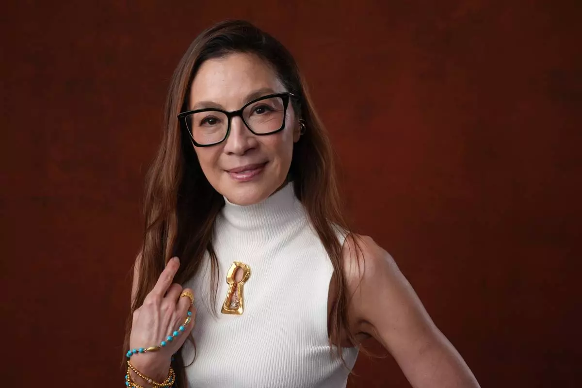 Michelle Yeoh poses for a portrait to promote "Blade Runner 2099" during Comic-Con International on Friday, July 24, 2026, in San Diego. (AP Photo/Chris Pizzello)