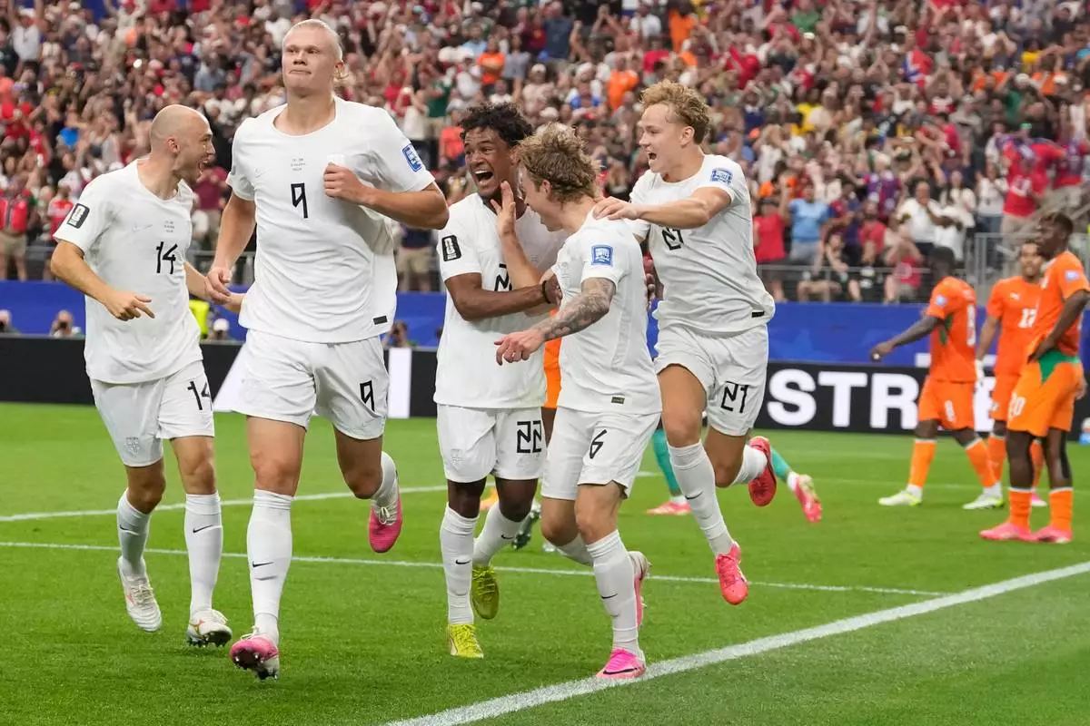 Norway's Erling Haaland (9) celebrates after scoring his side's second goal during the World Cup round of 32 soccer match between Ivory Coast and Norway in Arlington, Texas, near Dallas, Tuesday, June 30, 2026.(AP Photo/Tony Gutierrez)