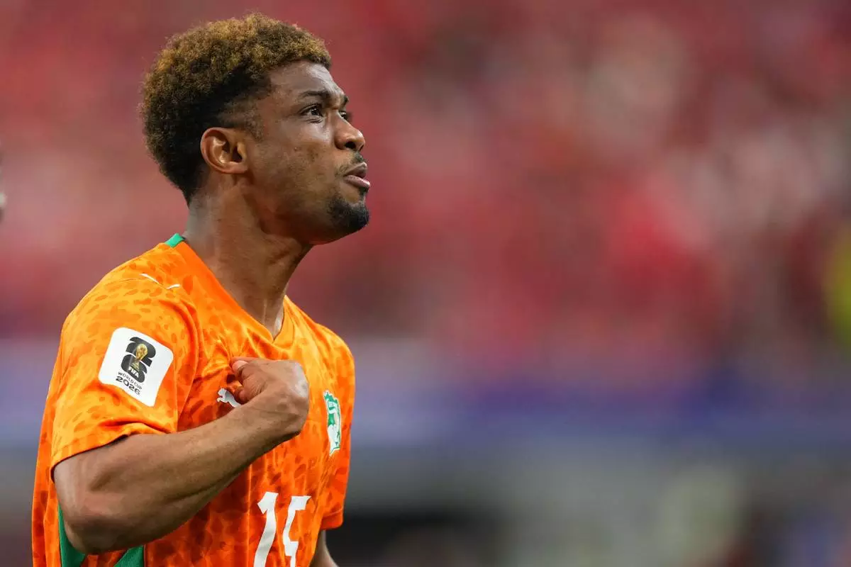 Ivory Coast's Amad Diallo (15) celebrates after scoring his side's opening goal during the World Cup round of 32 soccer match between Ivory Coast and Norway in Arlington, Texas, near Dallas, Tuesday, June 30, 2026. (AP Photo/Julio Cortez)