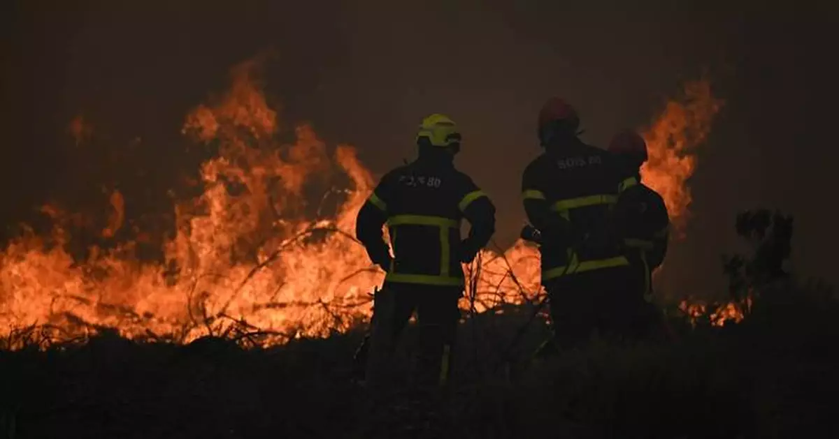 Wildfires in France drive 250,000 people from their homes, creep toward wine city