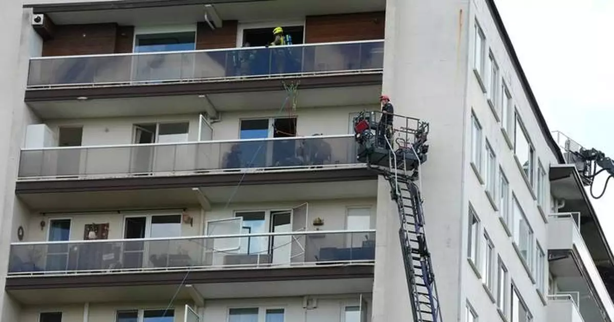 Fire in Belgian apartment block leaves at least 6 people dead, many injured