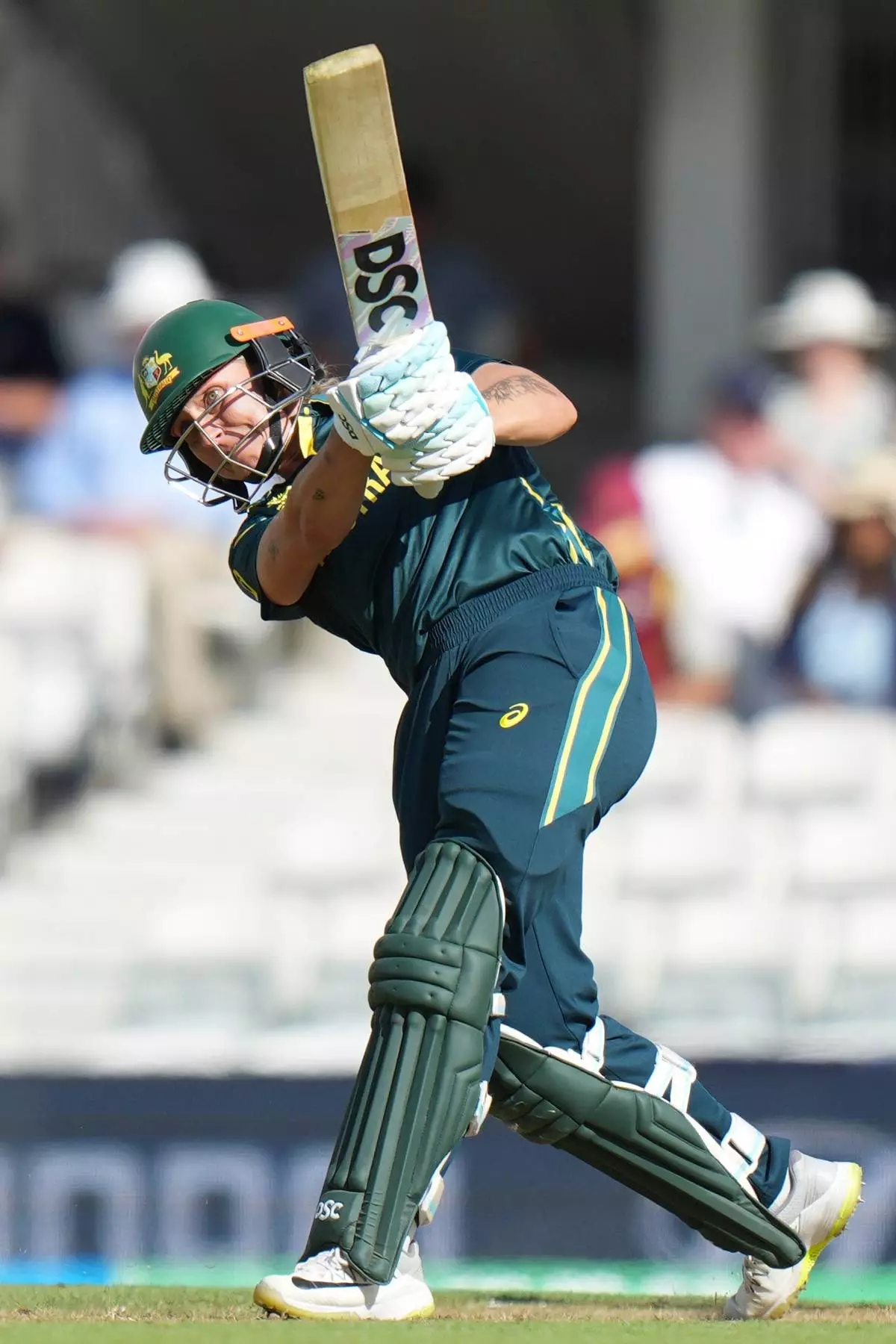 Australia's Ashleigh Gardner hits a six during the Women's T20 Cricket World Cup semifinal between Australia and West Indies in London, Tuesday, June 30, 2026. (AP Photo/Alastair Grant)