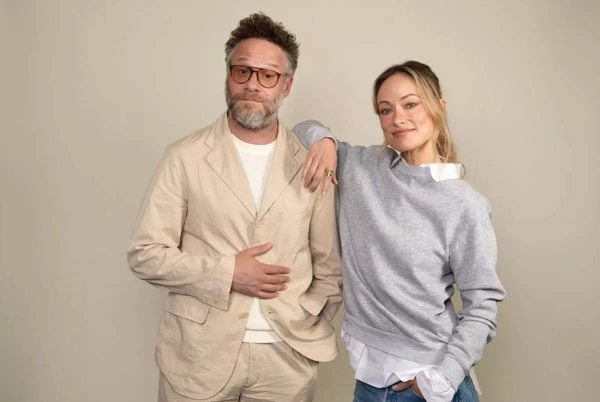 Seth Rogen, left, and Olivia Wilde pose for a portrait in Los Angeles to promote their film "The Invite" on Sunday, May 31, 2026. (Photo by Rebecca Cabage/Invision/AP)