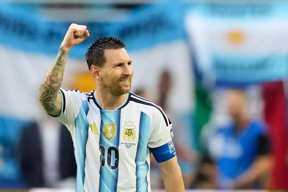 Argentina's Lionel Messi celebrates scoring his side's opening goal against Cape Verde during the World Cup round of 32 soccer match in Miami Gardens, Fla., Friday, July 3, 2026. (AP Photo/Rebecca Blackwell)