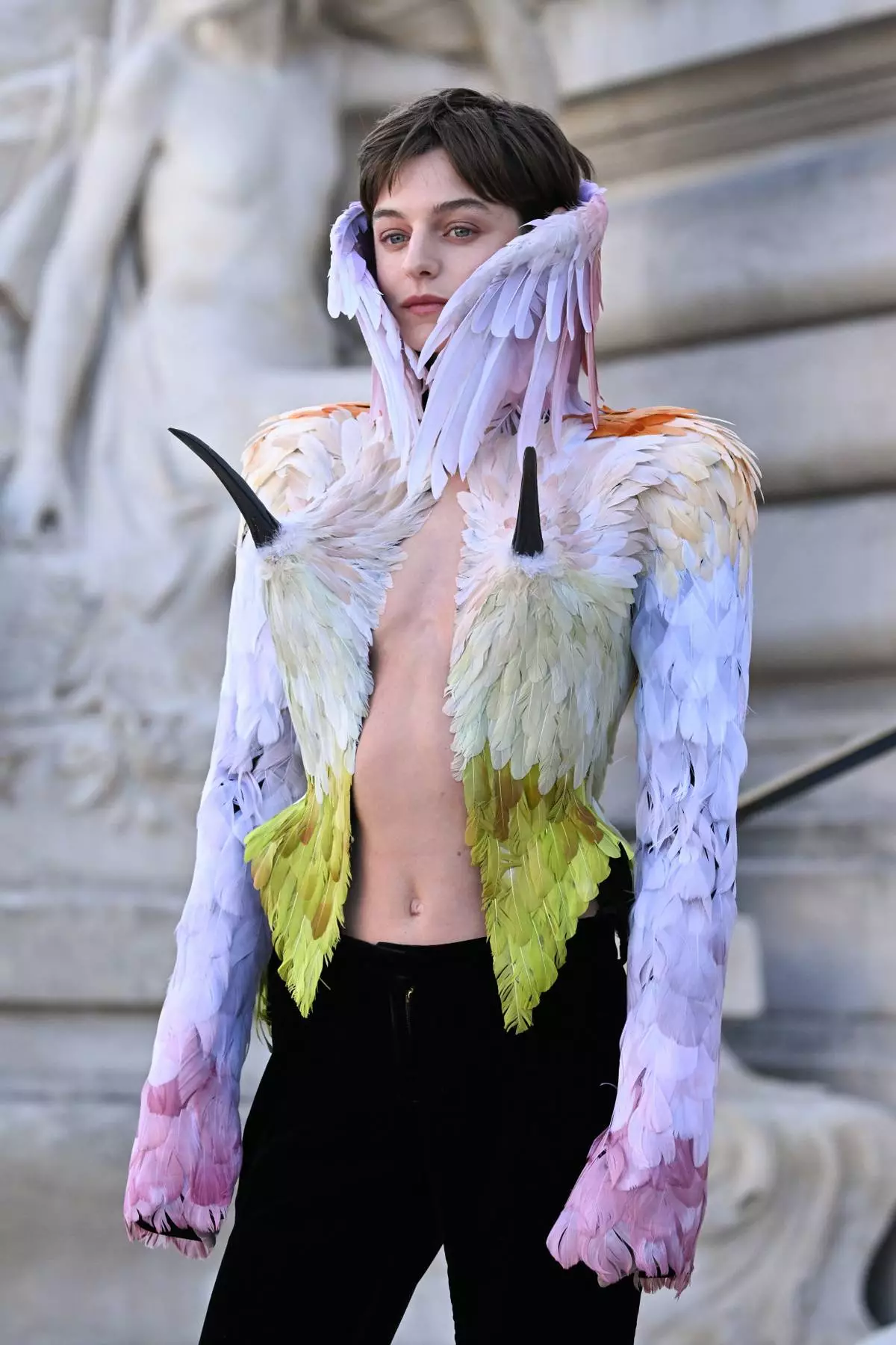 Emma Corrin arrives for the Schiaparelli Haute Couture Fall/Winter 2026-2027 Women's collection presented in Paris, Monday, July 6, 2026. (AP Photo/Emma Da Silva)