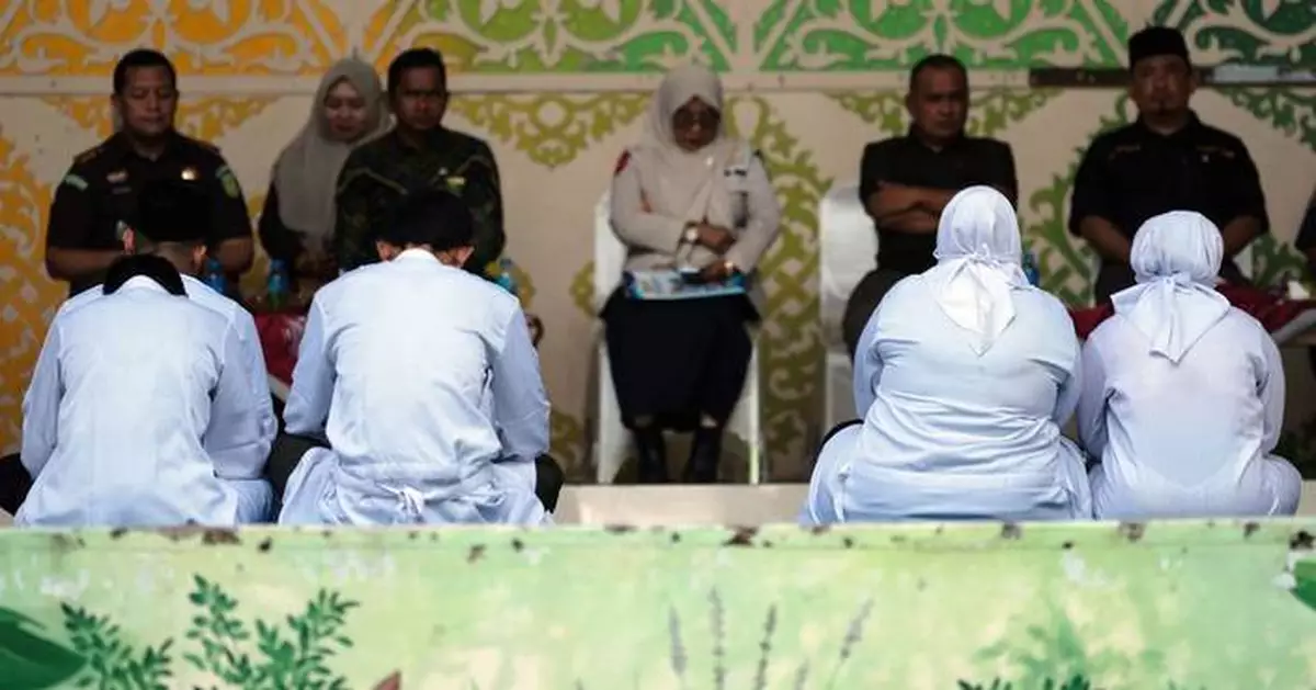 Couple caned for kissing on TikTok in Indonesia's conservative Aceh province