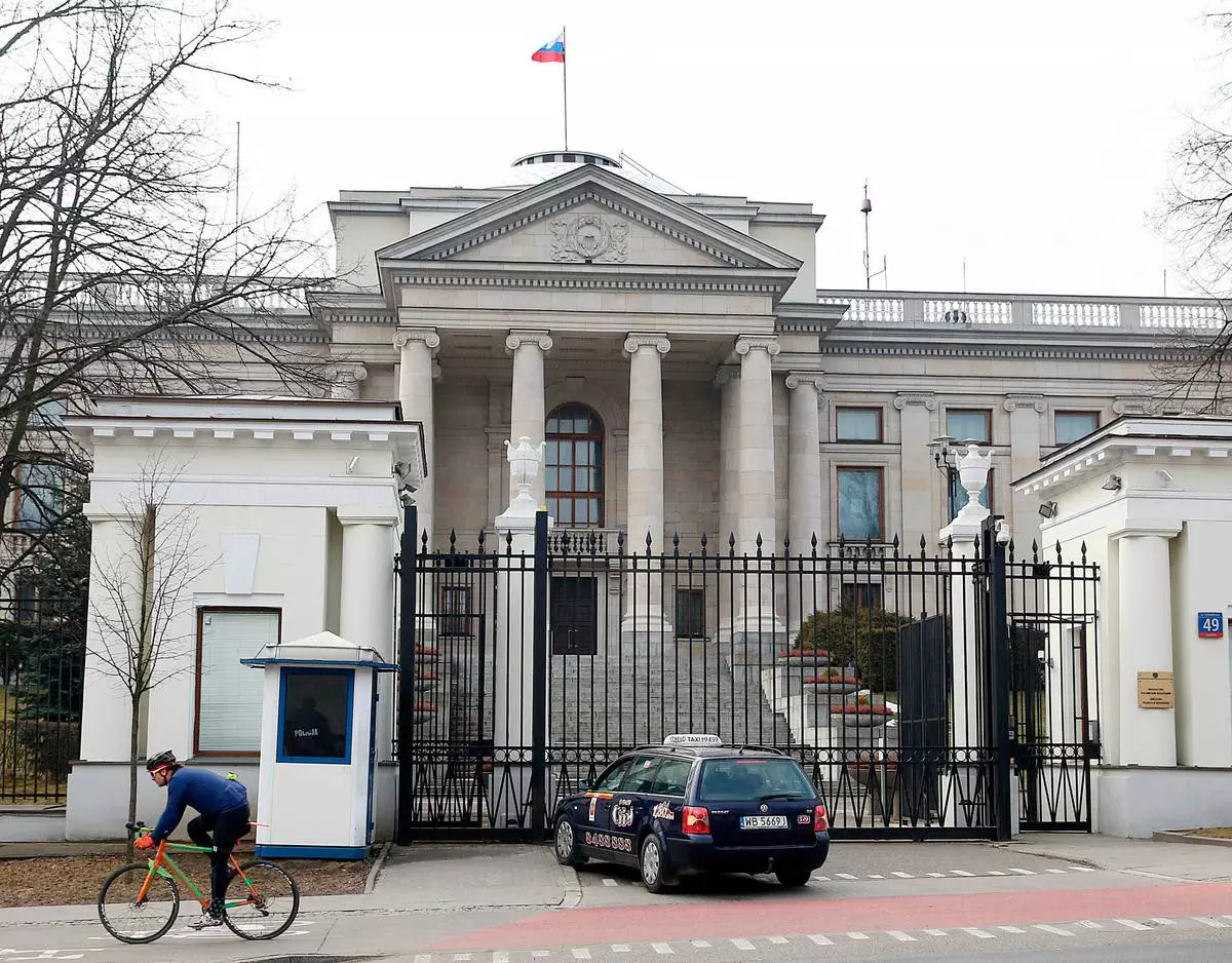 FILE - A taxi in front of the Russian Embassy in Warsaw, Poland, Monday, March 26, 2018. (AP Photo/Czarek Sokolowski, File)