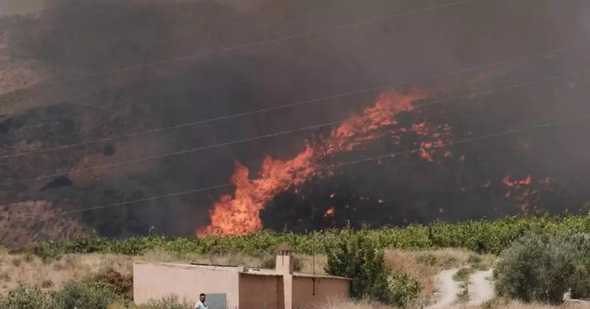 One of Spain's deadliest wildfires has killed at least 12 people, with 23 others missing