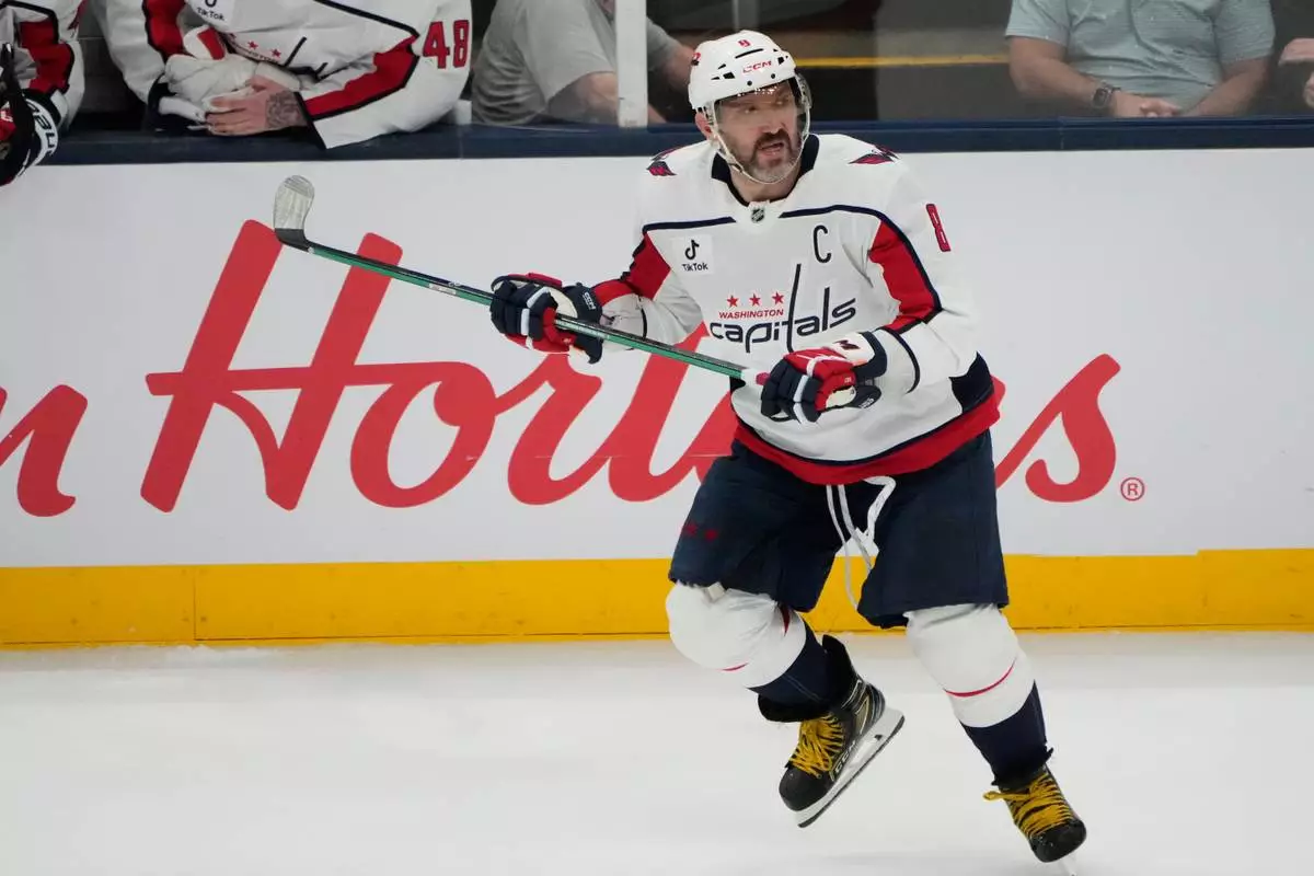FILE - Washington Capitals left wing Alex Ovechkin (8) skates in the third period of an NHL hockey game against the Columbus Blue Jackets on April 14, 2026, in Columbus, Ohio. (AP Photo/Sue Ogrocki, File)