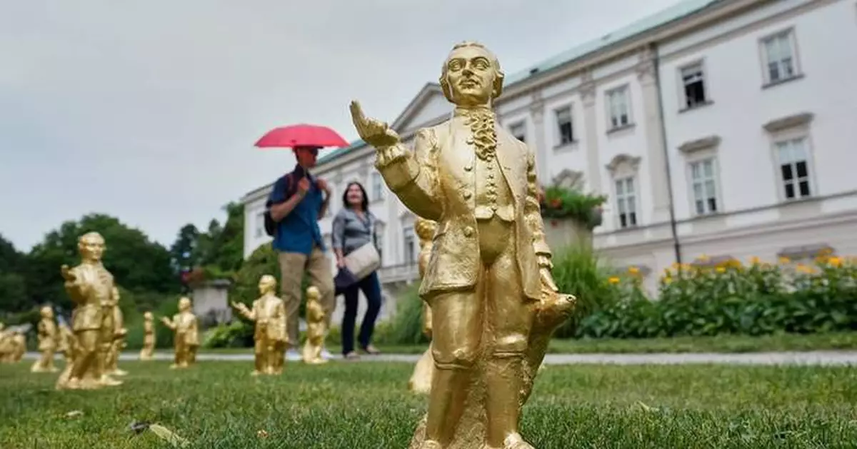 A horde of golden mini-Mozarts marks 270 years since the composer's birth in Salzburg
