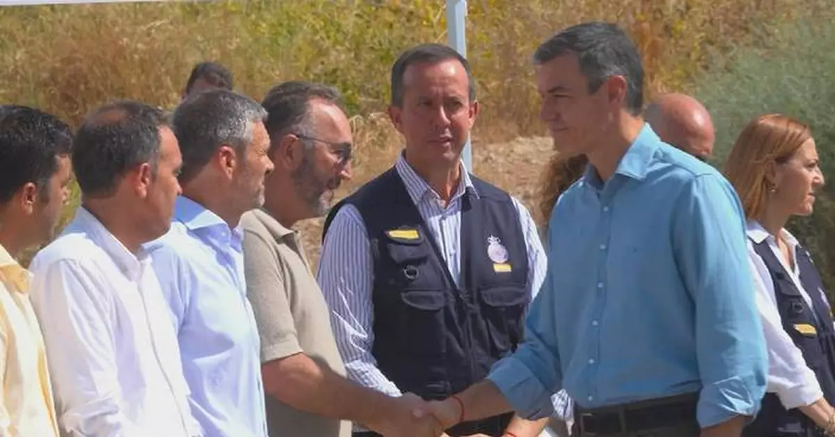 Spain's prime minister visits wildfire site as death toll reaches 13