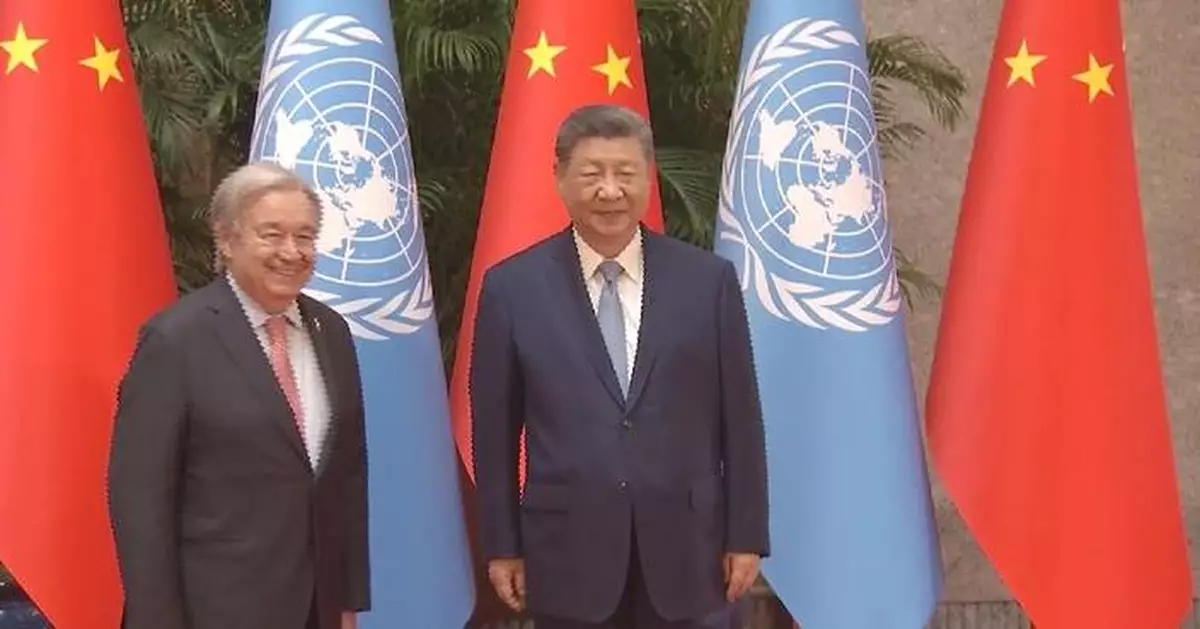 Xi meets UN chief in Shanghai
