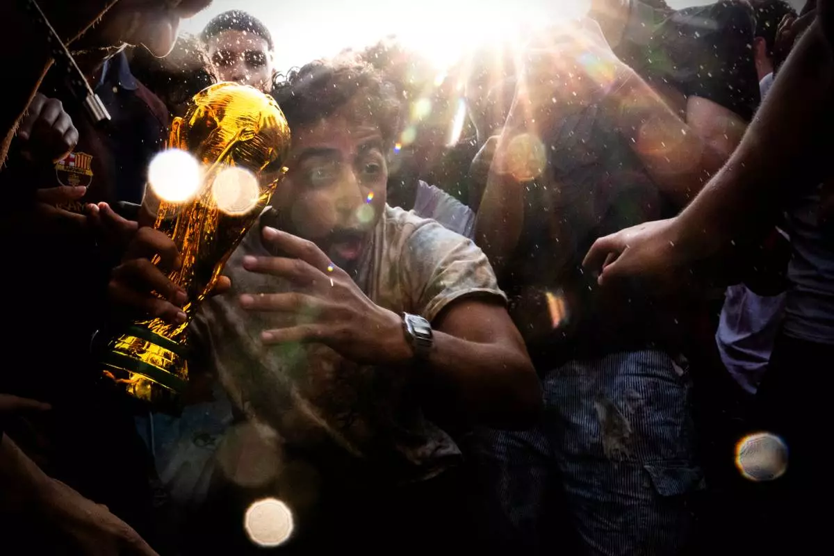 Fans celebrate after Spain beat Argentina in the World Cup final soccer match, Sunday, July 19, 2026, at the FIFA Fan Zone on the National Mall in Washington. (AP Photo/Julia Demaree Nikhinson)