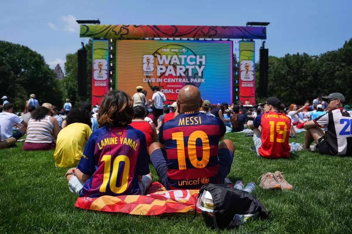 Fans gather for a watch party in Central Park ahead of the World Cup final soccer match between Argentina and Spain, Sunday, July 19, 2026, in New York. (AP Photo/Anna Connors)