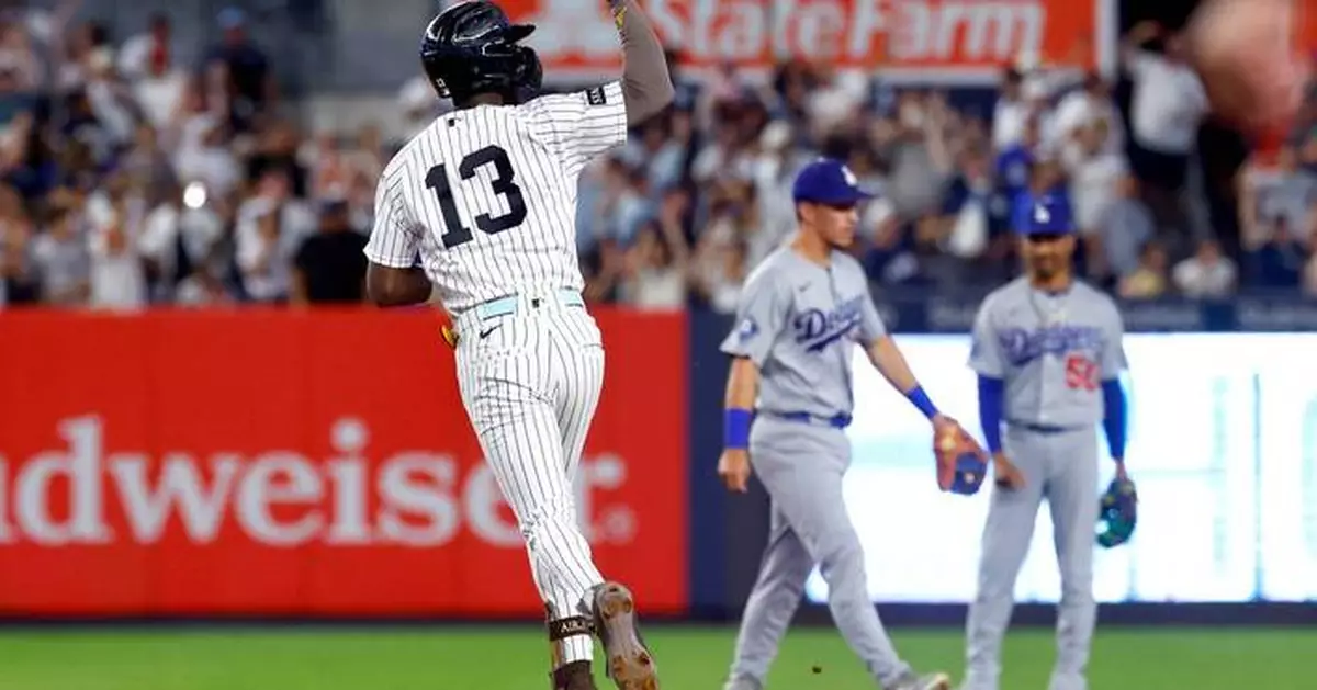Jazz Chisholm Jr. hits tiebreaking homer in 8th and Yankees beat Dodgers 2-1 to split doubleheader