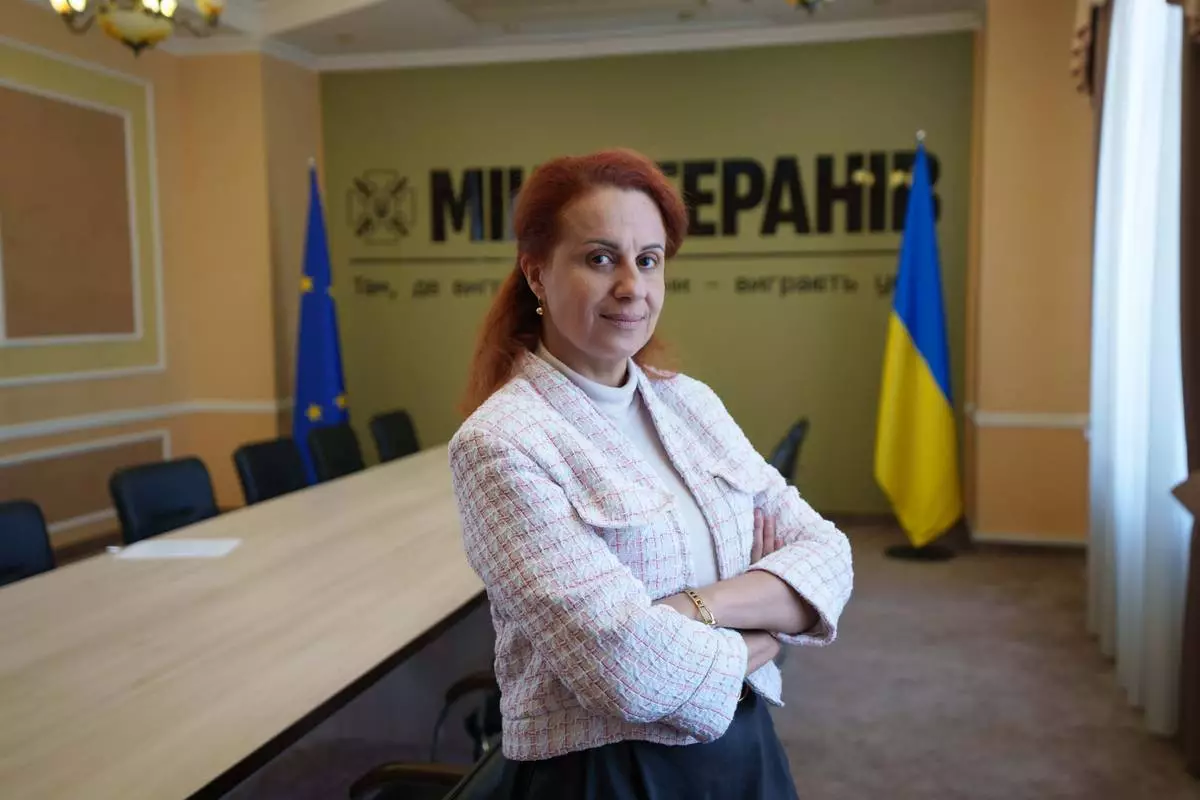Natalia Kalmykova, Ukraine's Veterans Affairs Minister poses for a photo at her office in Kyiv, Ukraine, Wednesday, June 17, 2026. (AP Photo/Evgeniy Maloletka)