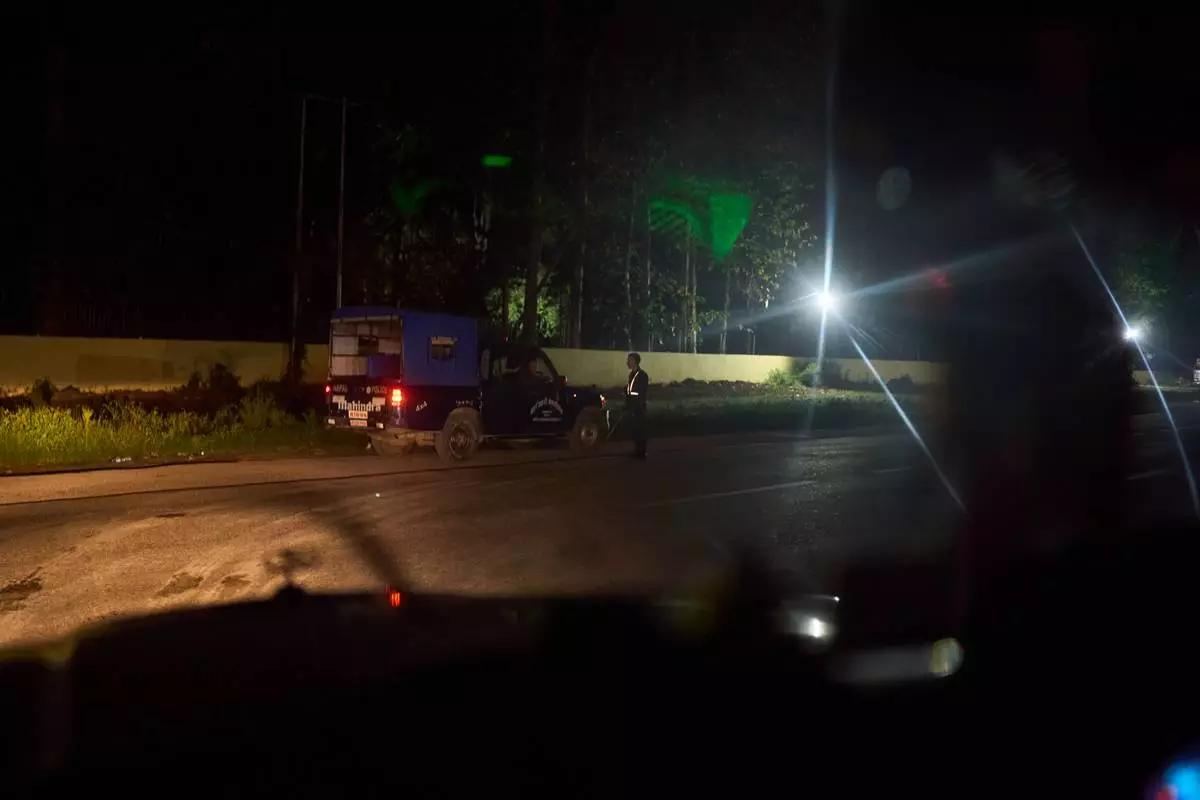 Police are seen at a meeting spot for transgender sex workers in Hetauda, Nepal, Friday, May 15, 2026. (AP Photo/Bram Janssen)