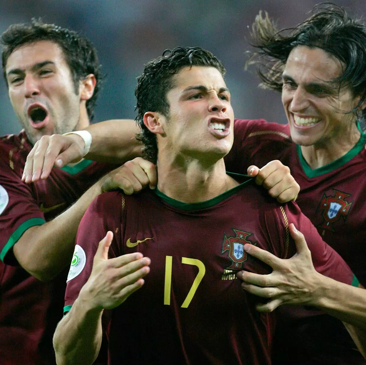 FILE - Portugal's Cristiano Ronaldo celebrates with teammates after scoring the winning penalty kick in a shootout against England during the quarterfinal World Cup soccer match in Gelsenkirchen, Germany, July 1, 2006. (AP Photo/Matt Dunham, File)