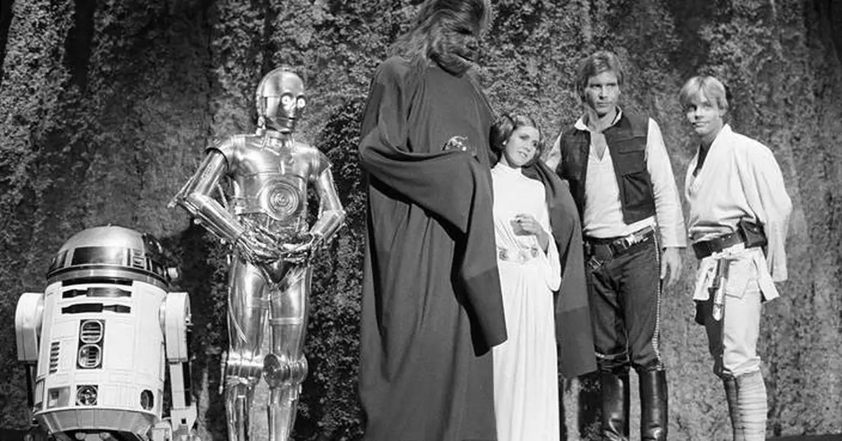 Luke Skywalker's 'Empire Strikes Back' lightsaber with severed hand attached auctioned for $3.75M