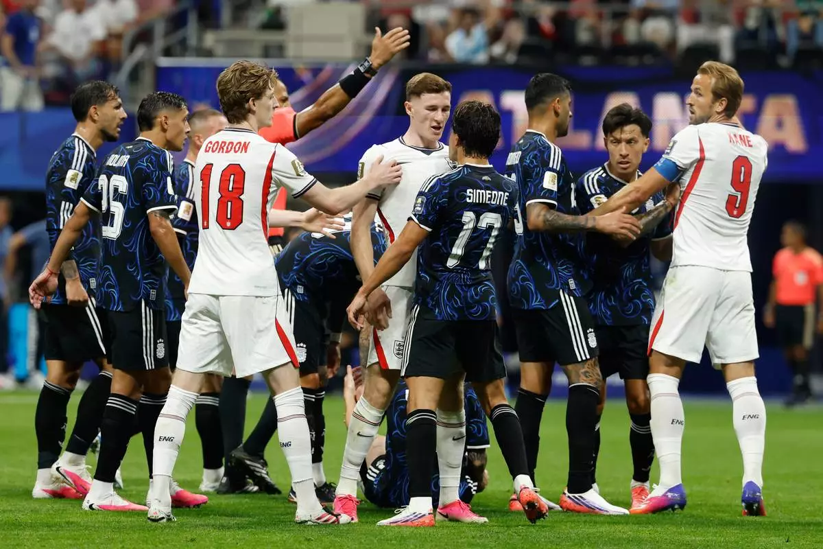 Players argue during the World Cup semifinal soccer match between England and Argentina in Atlanta, Wednesday, July 15, 2026. (AP Photo/Erik S. Lesser)