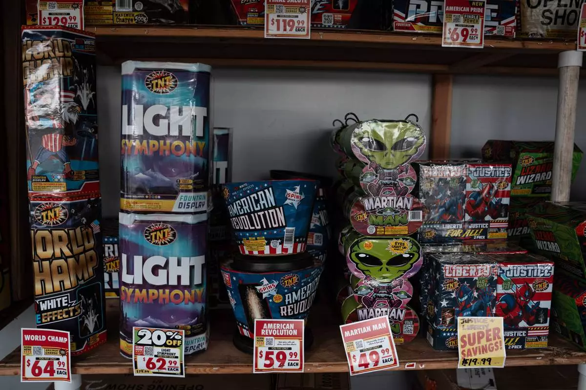 Packages of fireworks are displayed at a TNT Fireworks stand in Alhambra, Calif., Tuesday, June 30, 2026, ahead of the Fourth of July holiday. (AP Photo/Jae C. Hong)
