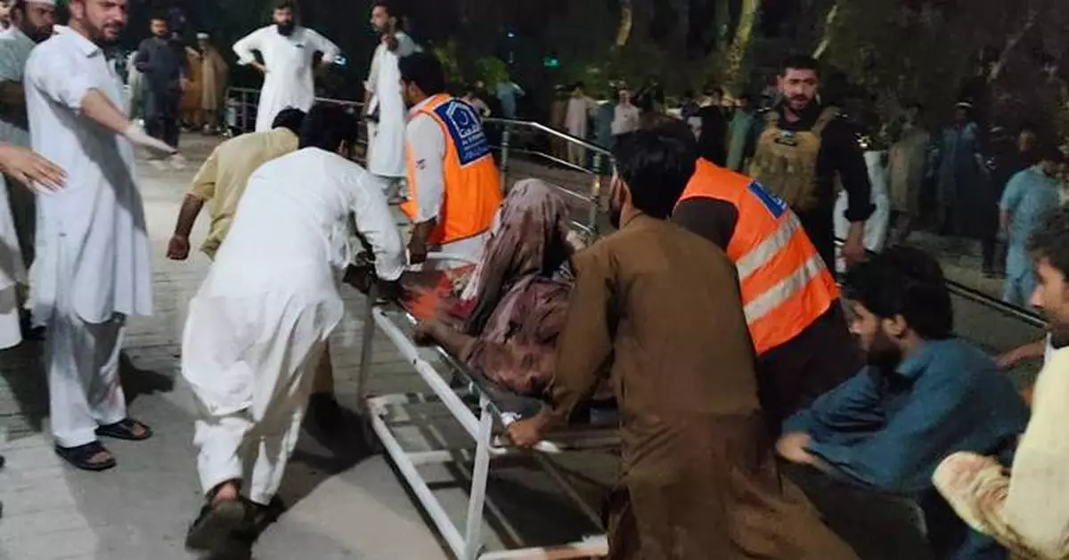 Twin attacks by militants kill 3 police officers, wound 20 in restive northwest Pakistan