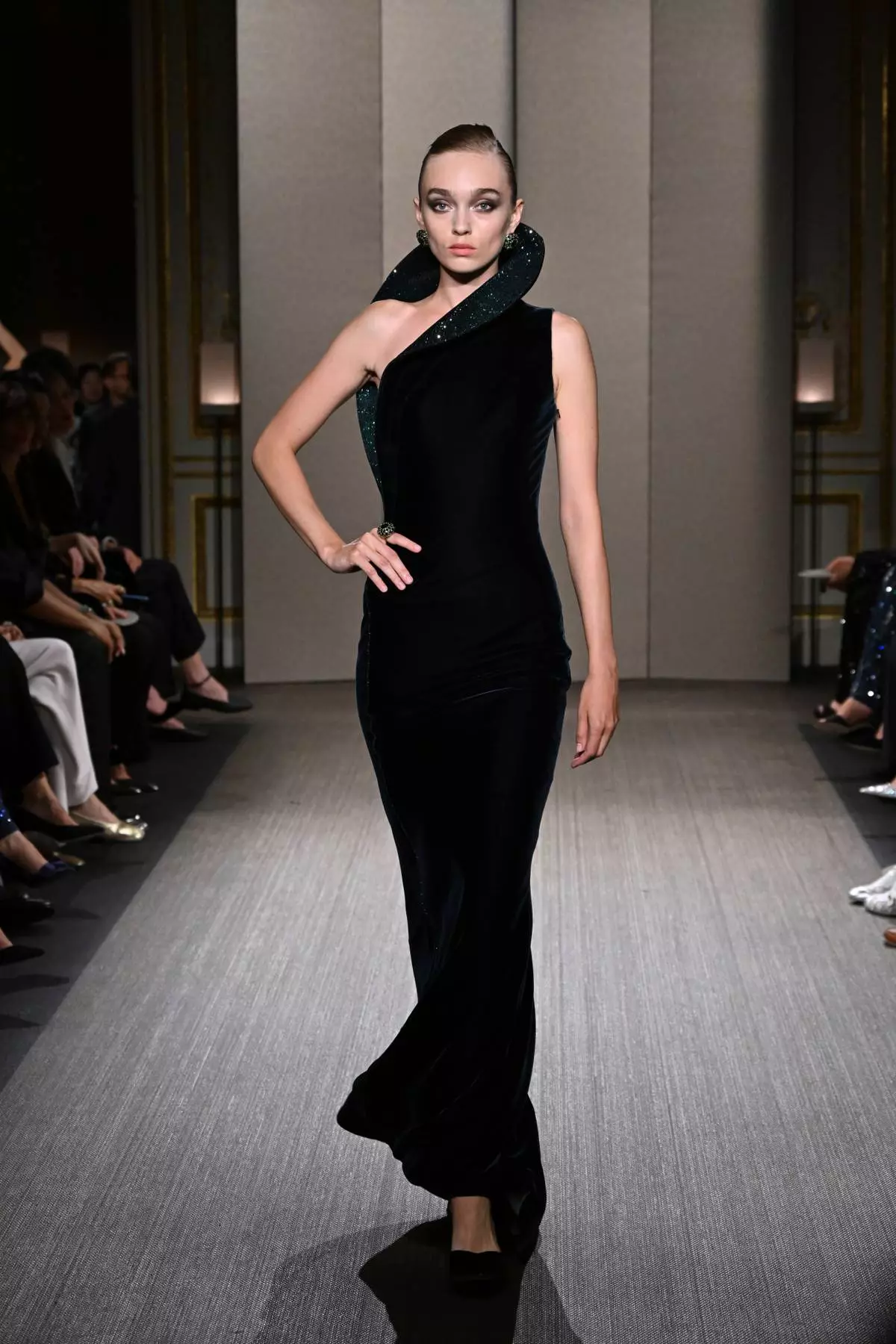 A model wears a creation as part of the Giorgio Armani Privé Haute Couture Fall/Winter 2026-2027 Women's collection presented in Paris, Tuesday, July 7, 2026. (AP Photo/Emma Da Silva)