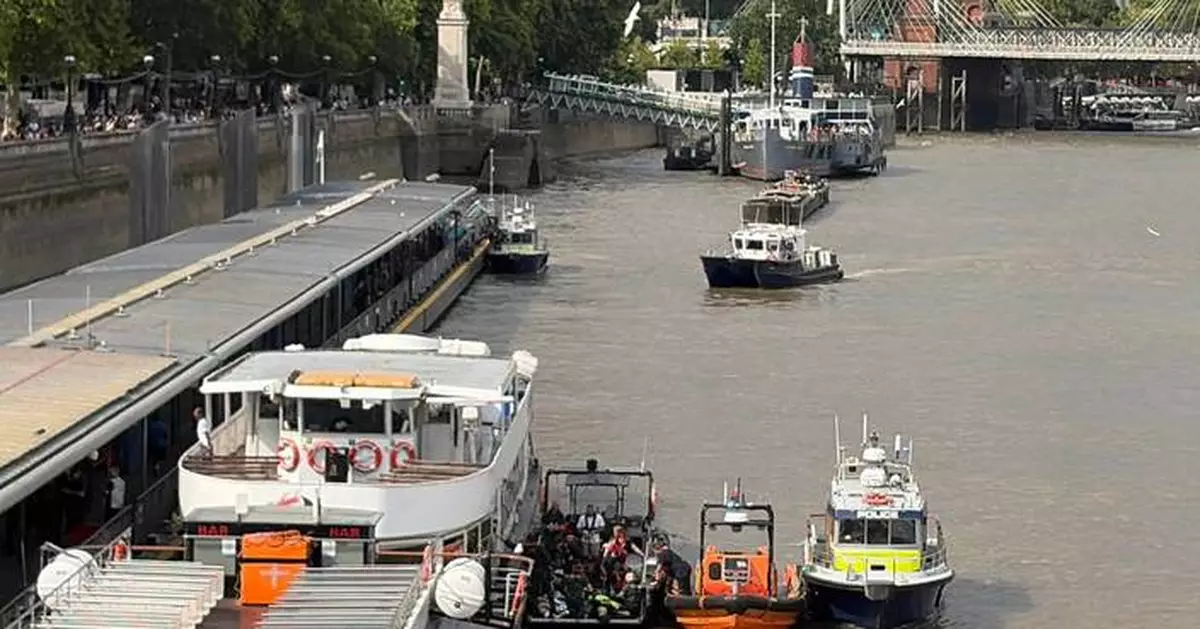 Police boat crashes into bridge in central London, sending officers into the Thames