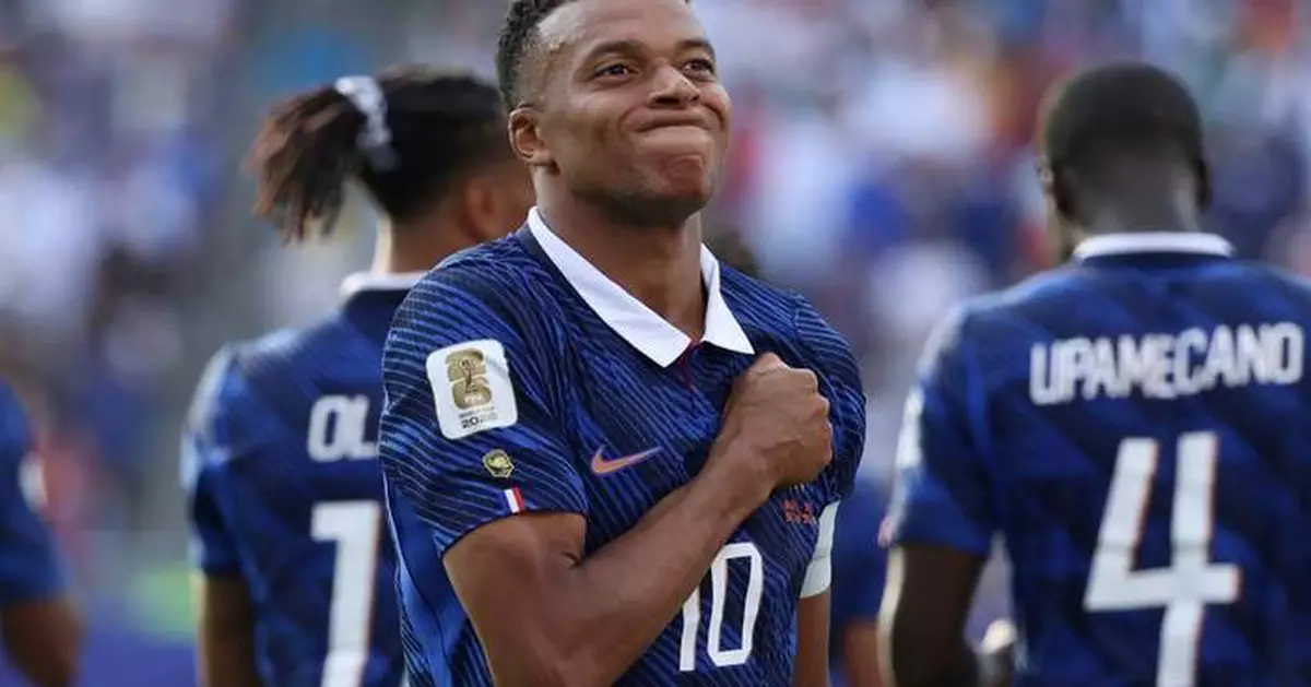 Mbappé scores twice to tie Messi for World Cup lead with 6 goals, France beats Sweden 3-0