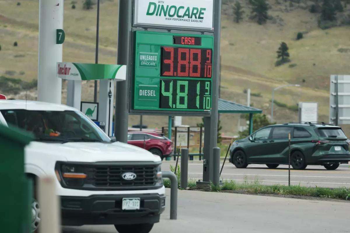 Gas prices are displayed at a Sinclair gas station along Interstate 70, Thursday, July 23, 2026, in Golden, Colo. (AP Photo/David Zalubowski)