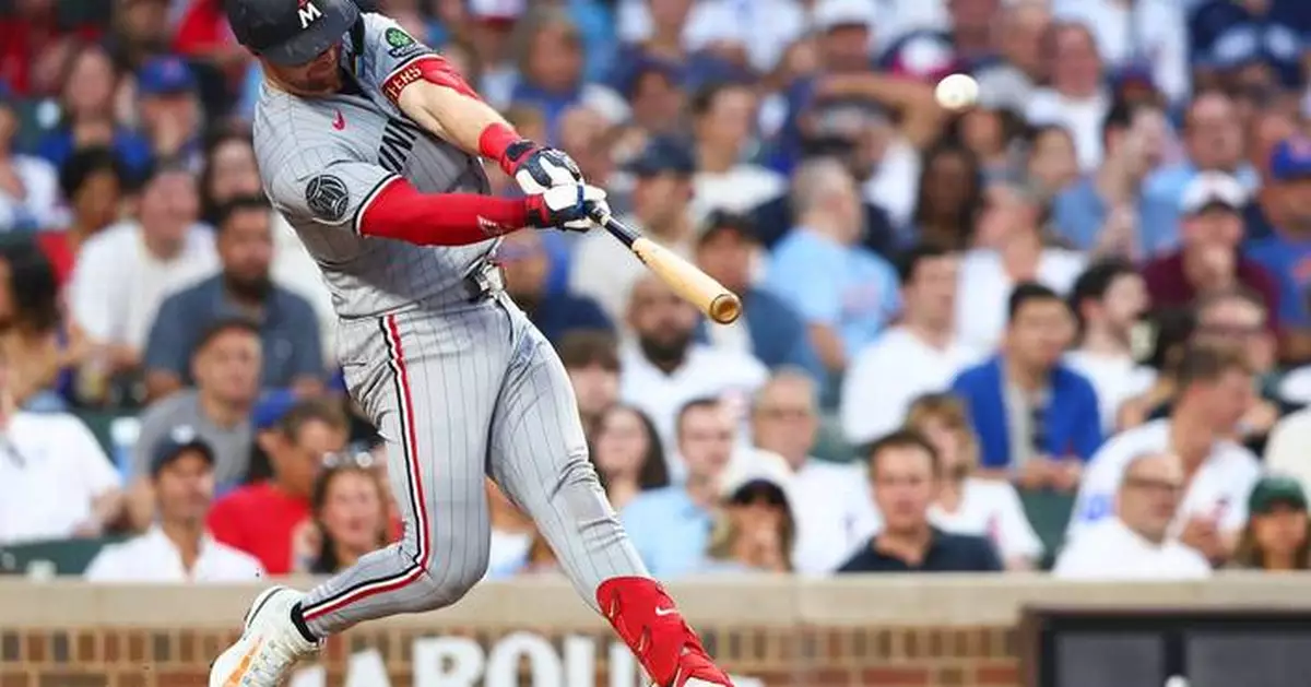 Jeffers hits 3-run HR to back Ober in the Twins' 5-2 win over the Cubs