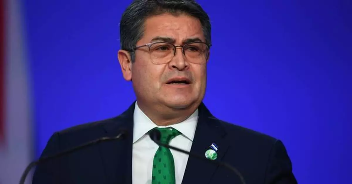 Former President Juan Orlando Hernández returns to Honduras after arrest warrant suspended