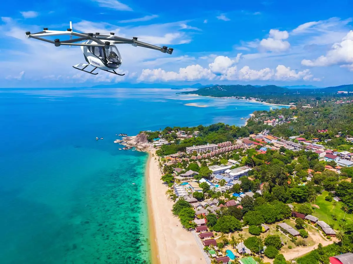 Rendering of the SKYDRIVE (SkyDrive model SD-05) flying over Ko Samui