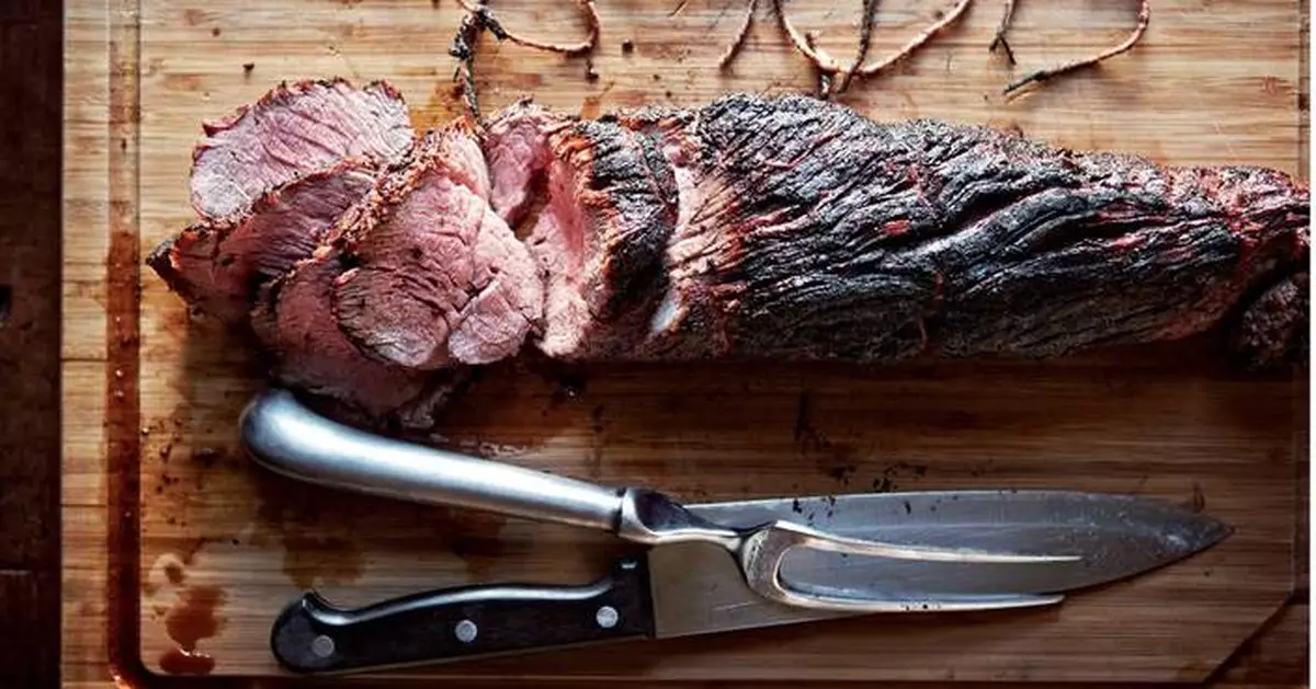 This smoky, fire-kissed beef tenderloin with herb butter comes from Canal House