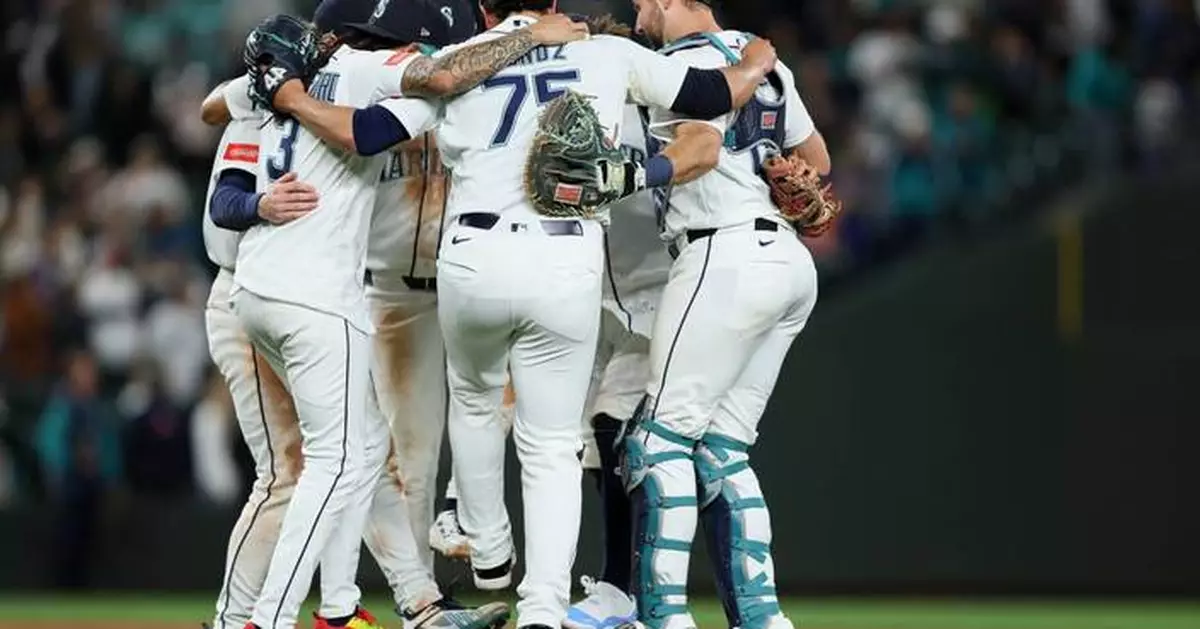 Mariners have big sixth inning to back Woo in an 8-3 victory over the Angels
