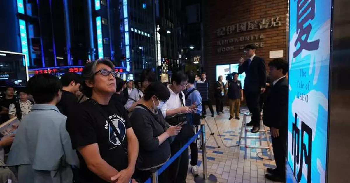 Fans mark the release of new Haruki Murakami novel at a midnight event in Tokyo