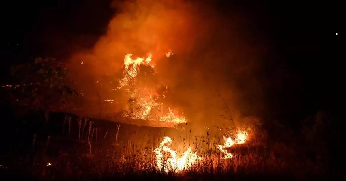 A fast-moving wildfire near Greece's Thessaloniki sparks evacuations as smoke blankets suburbs