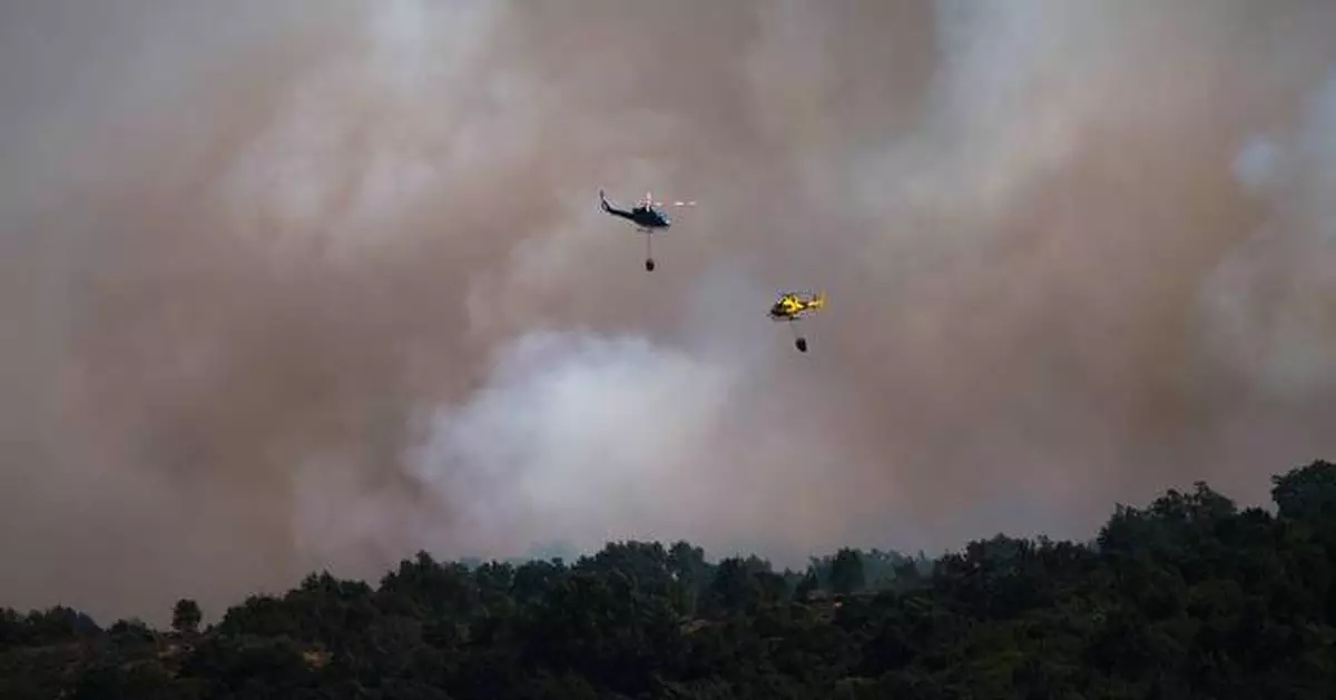 Europe battles fast-moving wildfires sweeping across Spain and France, in photos