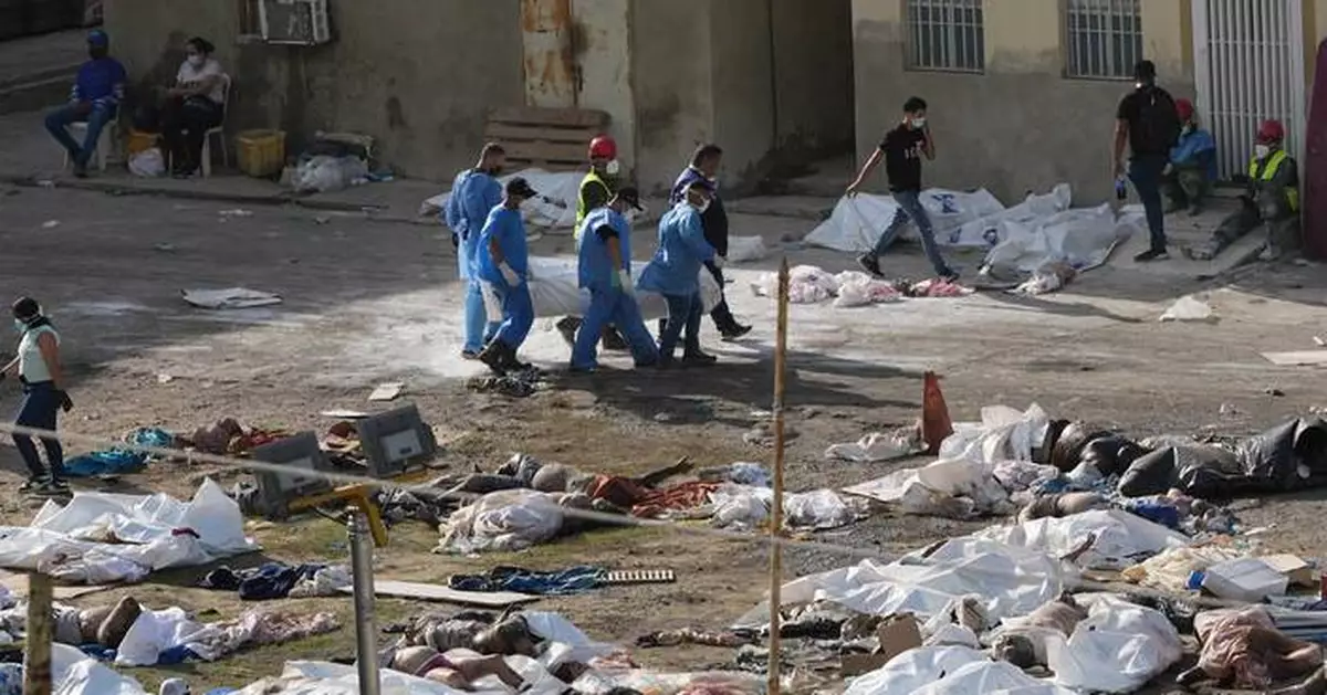A push to identify bodies as deaths multiply in Venezuela after twin earthquakes