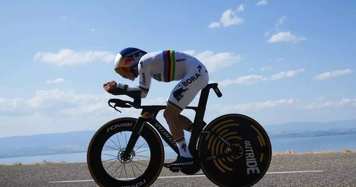 Evenepoel wins time trial for back-to-back Tour de France stage victories, Pogačar still leads