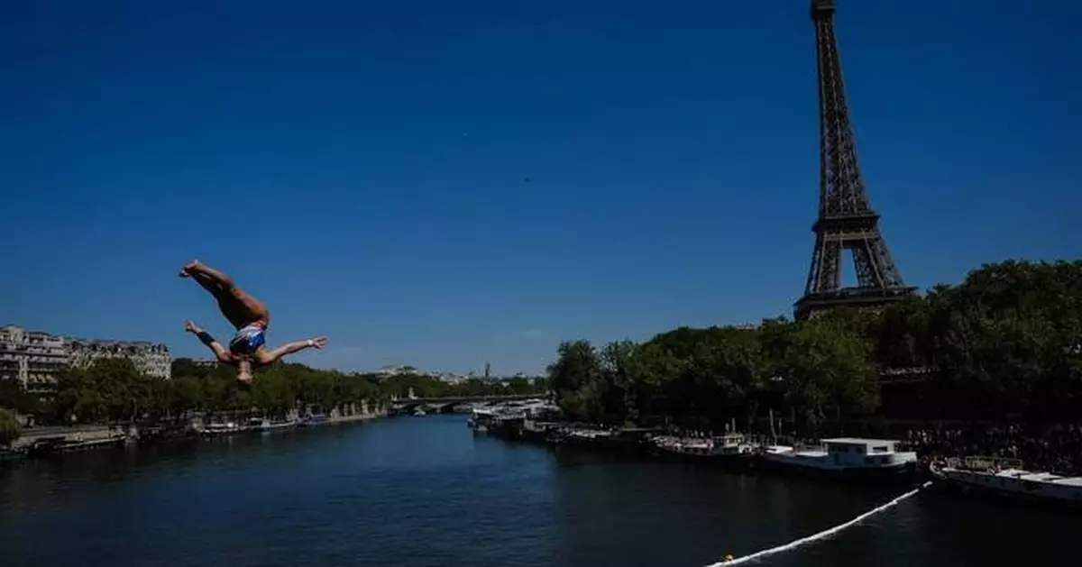 High divers take the plunge in the Seine in a new test of Paris’ reclaimed river