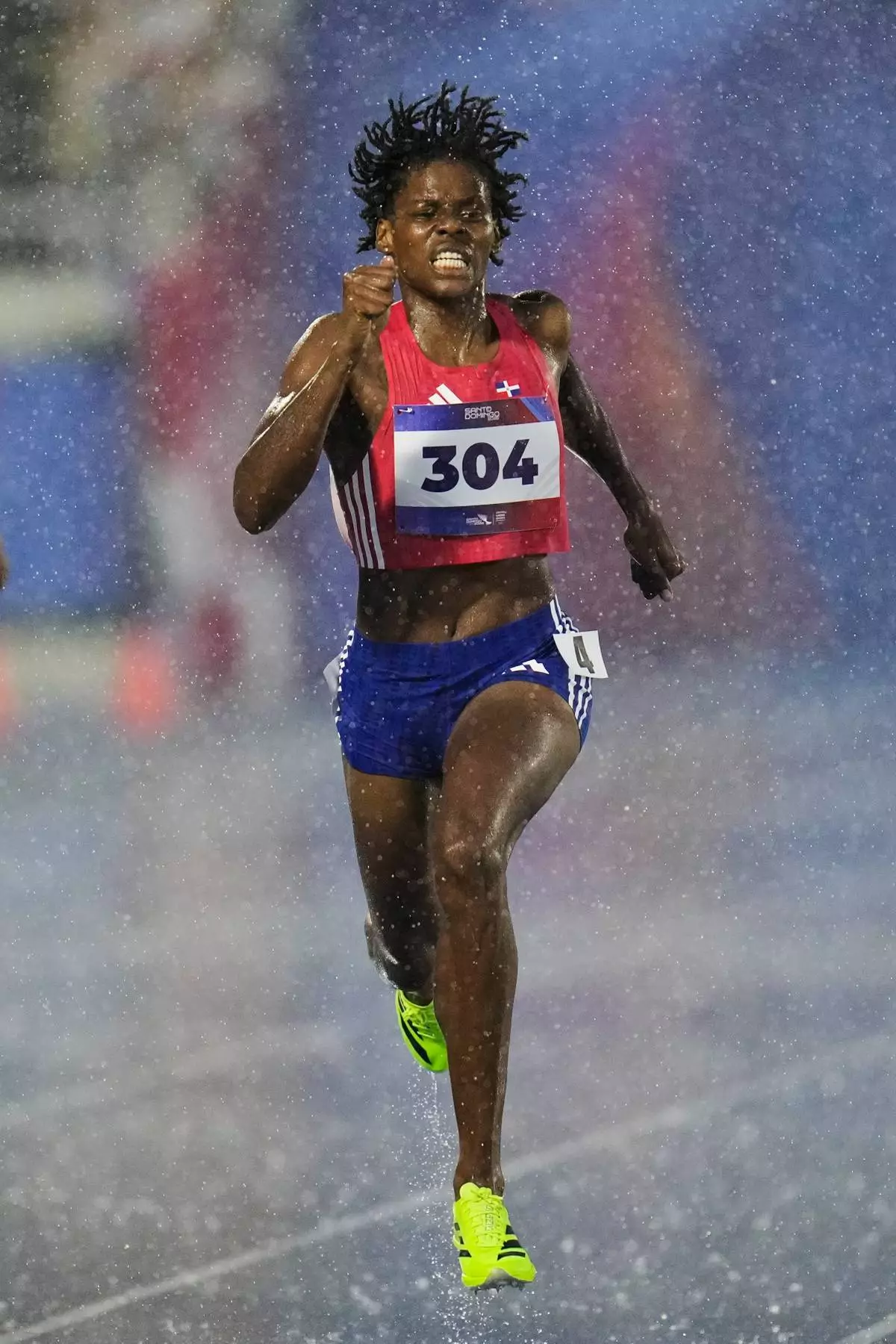 Dominican Republic's Marileidy Paulino competes in the women's 400-meter final at the Central American and Caribbean Games in Santo Domingo, Dominican Republic, Wednesday, Aug. 5, 2026. (AP Photo/Fernando Vergara)