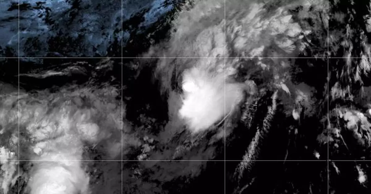 Tropical Storm Hernan forms in the Pacific while a different weather system could soak Hawaii