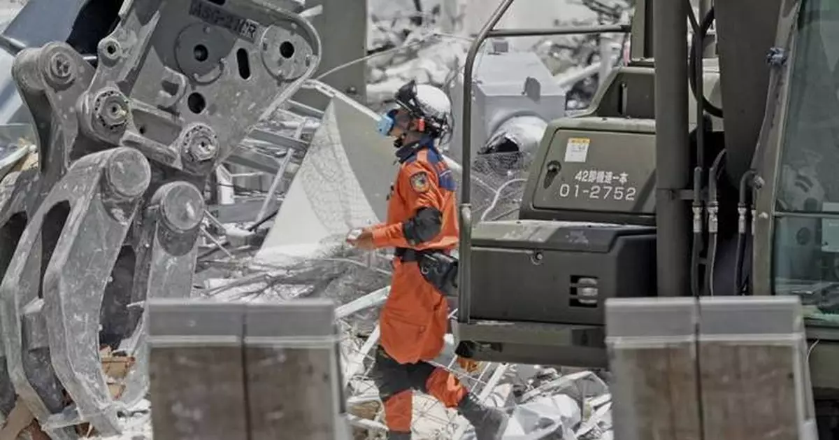 A woman with apparent heat stroke found dead while taking shelter in a car in quake-hit Japan