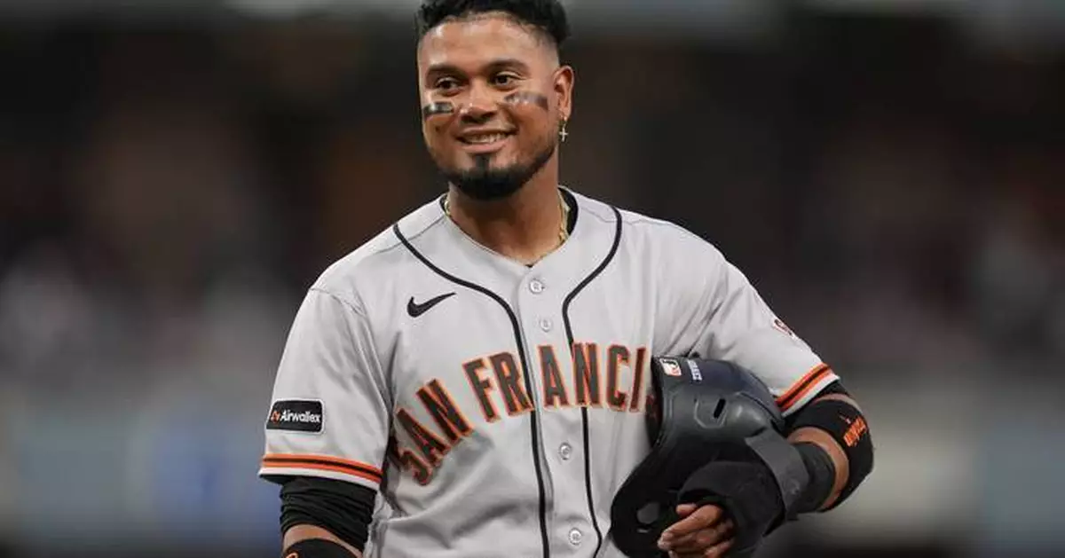 Arraez grateful to be in playoff race and thanks new Phillies teammate Harper for changing positions