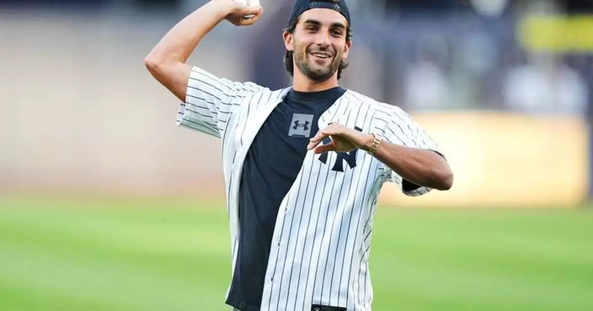World Cup hero Ferran Torres of Spain throws first pitch at Yankee Stadium