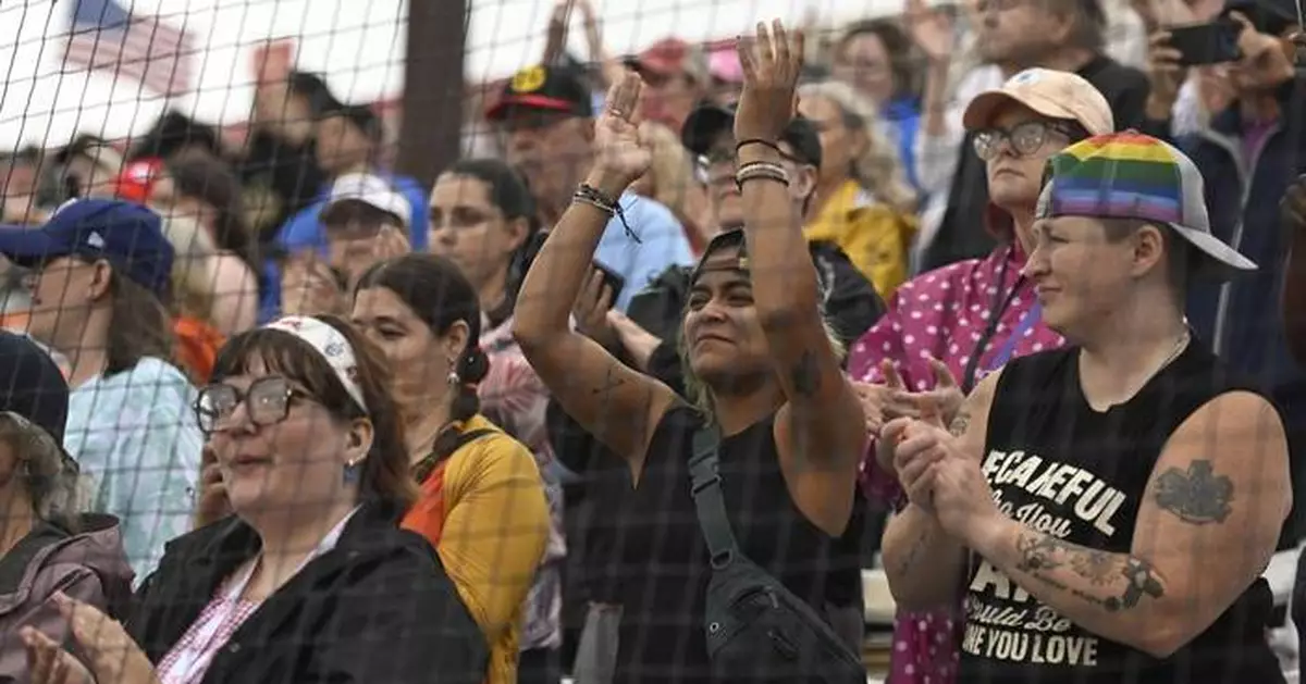 Women's Professional Baseball League makes a rainy debut in front of enthusiastic crowd