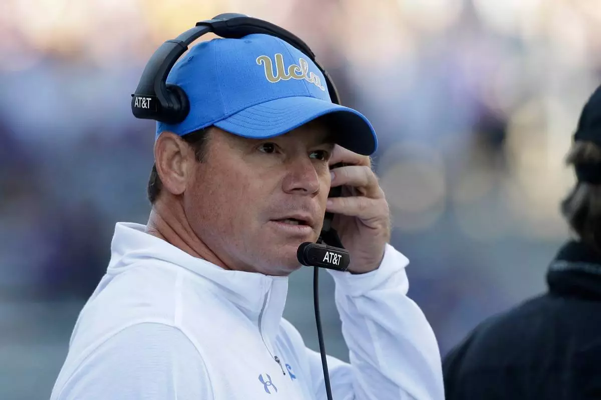 UCLA head coach Jim Mora looks toward the field against Washington in the first half of an NCAA college football game Saturday, Oct. 28, 2017, in Seattle. (AP Photo/Elaine Thompson)