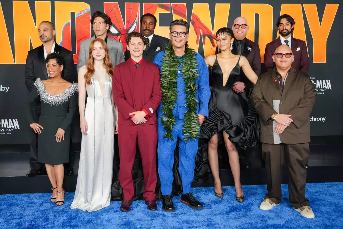 Michael Mando, from left, Liza Colon-Zayas, Sadie Sink, Jon Bernthal, Tom Holland, Tramell Tillman, director Destin Daniel Cretton, Zendaya, Marvin Jones III, Jacob Batalon, and Eman Esfandi arrive at the premiere of "Spider-Man: Brand New Day" on Monday, July 27, 2026, at the Dolby Theatre in Los Angeles. (Photo by Jordan Strauss/Invision/AP)