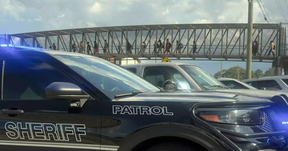 Student wounded and young suspect is in custody after shooting at Georgia high school, police say